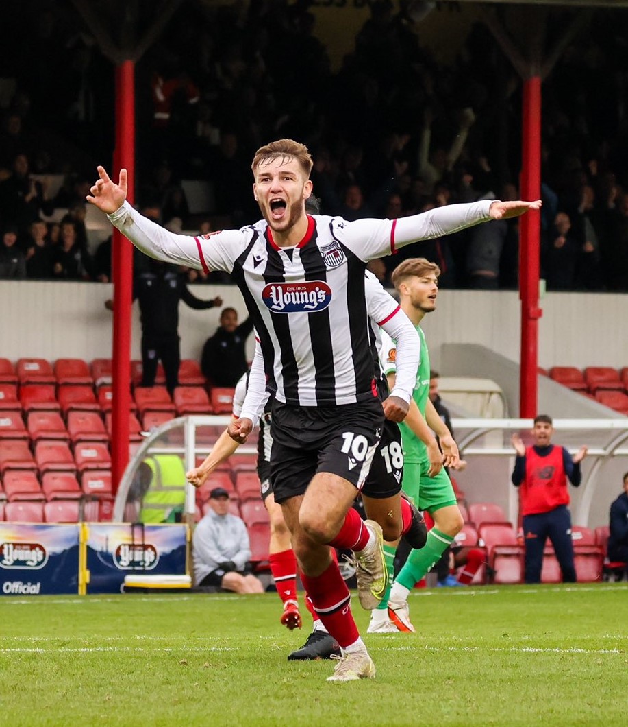 John McAtee celebrates scoring for Grimsby Town